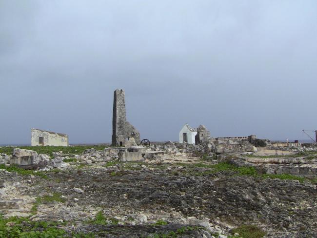 View across Sombrero Island showing vegetation on old industrial workings associated with past phosphate mining, - note the date the photo was taken is unknown, not as given