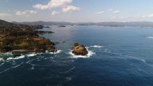 Viewing the gulf from Kamiwarizaki, the south side of the bay’s entrance. The island of Matsushima is upfront, while the island of Tsubakishima is located further into the gulf.